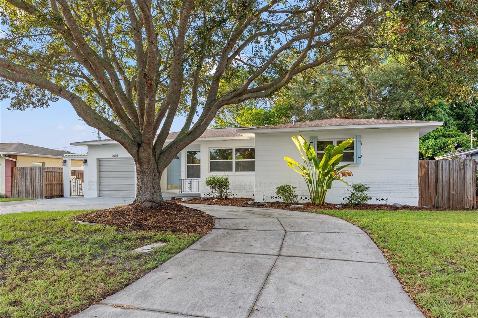 Welcome home to this 4 bed 2.5 bath home in north St Petersburg. This house has it all with a 2020 roof, RENOVATED bathrooms, UPDATED kitchen with stainless steel appliances and granite countertops, REFINISHED HARDWOOD floors, NEW IMPACT WINDOWS through most of the house, NEW DECK overseeing your lush back yard while you drink your morning coffee and more. Centrally located in north St Pete just minutes from I275 and all the shopping, dining and nightlife of downtown St Pete and 15 minutes to Florida's famous gulf beaches. Schedule your showing today!