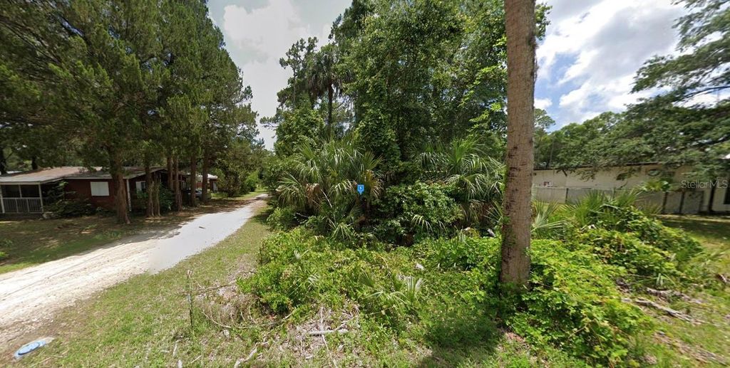 Photo of 55 Aragon Drive, Inglis, FL 34449 (MLS # A4667538)