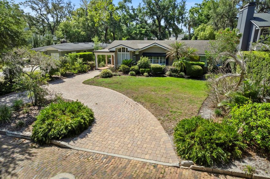 Set on an approximately one-quarter-acre homesite in a desirable Winter Park location, this property presents an exceptional opportunity to build a custom residence in one of Central Florida’s most sought-after communities. The existing property features a one-story pool home offering approximately 2,723 heated square feet with four bedrooms and three baths; however, the value is primarily in the land. A brick-paver circular driveway enhances the property’s curb appeal, while the generous lot size provides ample space to create a beautifully tailored new construction home. Ideally located just minutes from the vibrant shopping, dining and community events of downtown Winter Park and Park Avenue, the property also offers convenient access to downtown Orlando, major area hospitals, Orlando Executive Airport and Orlando International Airport. Zoned for highly regarded Audubon K-8 and Winter Park High School.