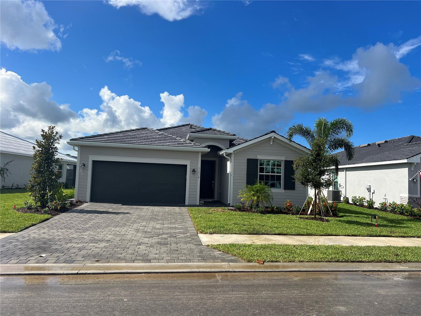 Welcome to 11319 Burgundy Dr, Venice, FL 34293, a beautifully single-family home in the gated Antigua / Wellen Park community. This modern residence offers 4 bedrooms, 3 bathrooms, spanning approximately 2,032?sq?ft. Open floor plan with bright living spaces and a seamless flow between the kitchen, dining, and living areas. Scenic lake views in a quiet, landscaped setting within a secure, gated development Located just minutes from downtown Wellen Park, Publix, and future Costco, this home provides both convenience and a Florida lifestyle.