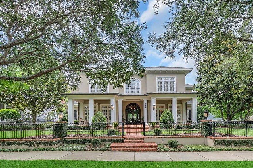 Custom built by Derek builders, this magnificent Baldwin Park home offers over 6,000 SF of fabulous living space and perched on a prime location in Baldwin Park! The oversized corner lot is approximately 1/3 of an acre, with an expansive covered front brick patio that overlooks the park and water feature in the middle of New Broad Street. This home has more bells and whistles, high-end finishes, and a functional, ideal floorplan for all your needs. 
Wrapped in a brick wall with multiple covered living spaces, the backyard is a private oasis, perfect for entertaining, with the convenience of being just blocks from downtown Baldwin Park. Past the perfectly manicured & fenced-in front lawn, and through the stunning beveled-glass French doors, enter the elegant foyer with detailed millwork and crown molding. Beyond the sunny living and dining rooms is the open family room with a designated surround sound system, built-ins, a gas fireplace, and French doors that lead to the pool & spa. The massive kitchen is wrapped in floor-to-ceiling Busby cabinetry, and offers a 6-burner dual fuel range, 3 ovens plus an Advantium microwave, a warming drawer, 48” side-by-side refrigerator/freezer, and a Miele built-in coffee maker. The center island includes a 2nd sink, 2 beverage coolers, a 2nd dishwasher, and a trash compactor. The hidden walk-in pantry and wet bar with icemaker make entertaining a breeze. 
Between the mudroom and laundry room is the expansive workstation with counter tops and storage galore. 
The downstair Main Suite is complete with a wet-bar & refrigerator, an extra-large walk-in closet, a “human carwash” shower, and a private water closet with a bidet-toilet. Upstairs features 3 large bedrooms with walk-in closets, 3 full bathrooms, and a storage room wrapped in shelving. 
The sophisticated office, outlined in wood paneling and trim, includes a gas fireplace, wet bar, cigar humidor, built-in cabinets/shelving, and a private storage room. Enjoy spending time in the Florida outdoors, where the back courtyard features 3 covered patios, heated pool & spa, summer kitchen, outdoor gas fireplace, and full bath with a steam shower. Off the pool deck is a walk-in gardening closet with a sink and a storage room. The 1-car garage is air-conditioned with epoxy floors, a work bench, and an air compressor. Over the detached, 2-car garage is a movie theater, with 8 power reclining, acoustic theater chairs, multi-aspect ratio screen, electronic shades, and a powder bathroom. The theater’s kitchenette includes a sink, refrigerator, dishwasher & microwave. The Crestron’s whole-house system manages the surround sound speakers inside and out, 3 AC units, security system, Lutron lighting and more. This Baldwin Park home exemplifies the perfect touch of quality, elegance, and convenience. Room Feature: Linen Closet In Bath (Primary Bathroom).