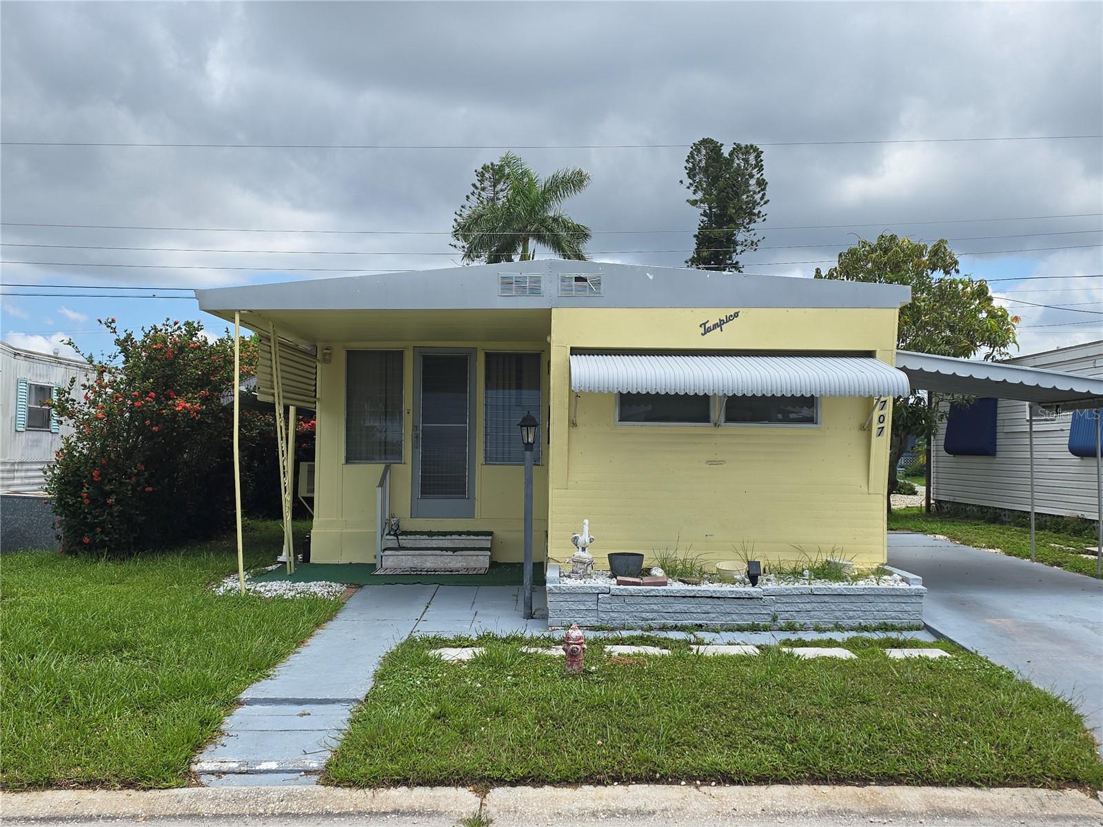 Turnkey furnished cute and clean 1 bedroom 1 bath home in Fairlane Acres in Bradenton Fl. Located close to the club house, the laundry, and shuffleboard courts. Low monthly fee of $134 includes water and sewer, a clubhouse, tennis courts, and a pool. The clubhouse has a laundry open from 6:00 am - 10:00 pm. This unit has baseboard heat and window air conditioners. Dogs and cats welcome. Must own for two years prior to renting out your home.