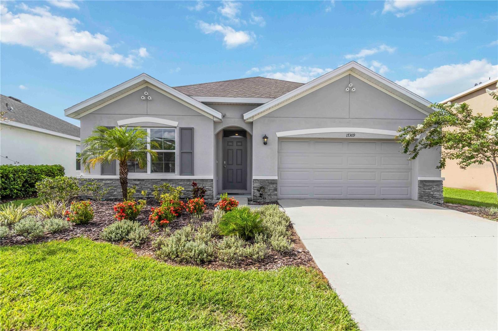 Welcome to 17309 Reserva Drive – a beautiful 4-bedroom, 2-bath home located in Sunny Lakewood Ranch!
This thoughtfully designed single-story home offers over 1,800 square feet of comfortable living space, all built with durable concrete block construction. Inside, you'll find an open-concept layout featuring an extended tile floor throughout the main living areas. The spacious kitchen overlooks the dining and living areas and comes fully equipped with stainless steel appliances, including a refrigerator, electric range, built-in microwave, and dishwasher – perfect for everyday living or entertaining guests.
The private Owner’s Suite is tucked away at the rear of the home and includes a walk-in closet and a spacious ensuite bath. Two additional bedrooms share a full bath, while the fourth bedroom—located near the laundry area with washer and dryer—makes an ideal guest room, office, or flex space.
Enjoy the Florida lifestyle in a vibrant community featuring a resort-style pool, two playgrounds, and a calendar full of fun, including monthly food trucks and holiday events. All of this in Lakewood Ranch, one of the top-ranked master-planned communities in the country. This school has priority at the brand new Lake Manatee Pk4-5th grade school opening in the Fall. Next year, the school will open 6th-8th Grade.
Don’t miss your chance to rent this move-in-ready home in a neighborhood known for community and connection! One small dog will be considered. Please reach out for an in-person or virtual showing.