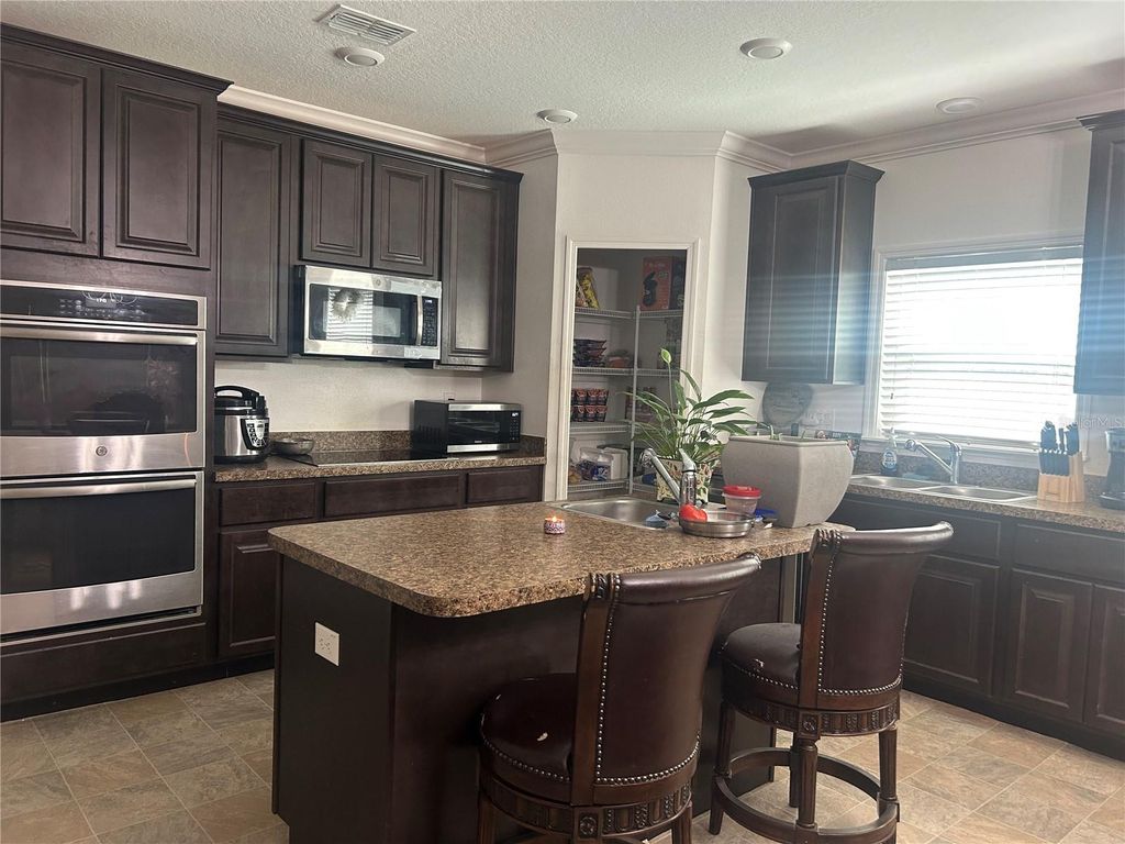 Photo of 16197 Medrick Rd, Weeki Wachee, FL 34614 (MLS # TB8434830)