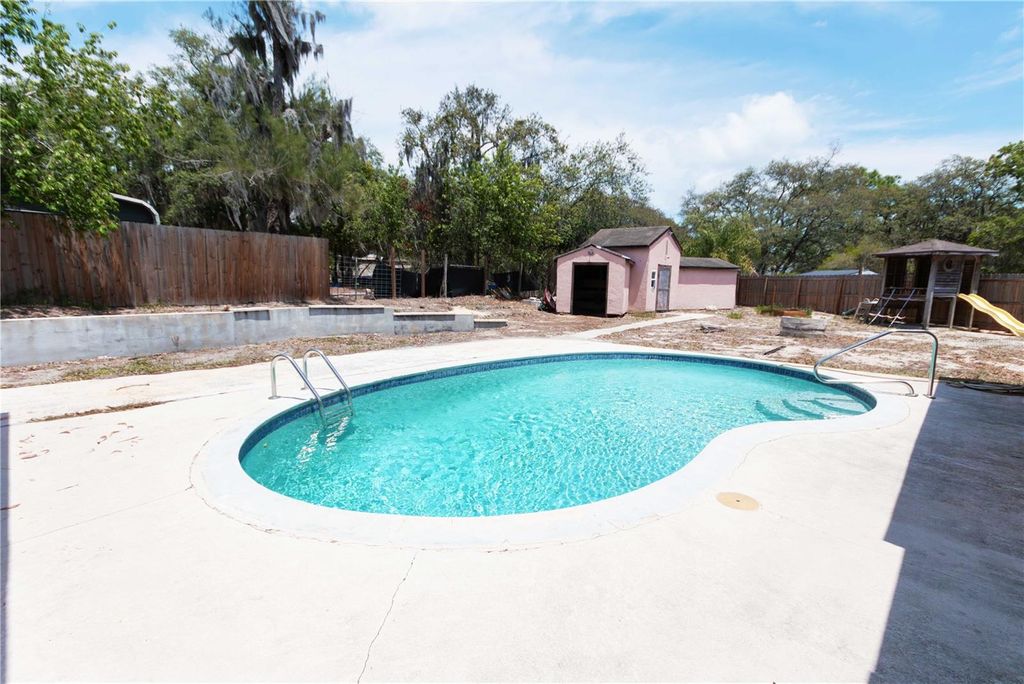 Photo of 9939 Woodridge Court, Port Richey, FL 34668 (MLS # W7884476)