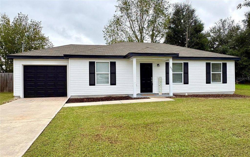 Photo of 203 Juniper Way, Ocala, FL 34480 (MLS # R4910042)