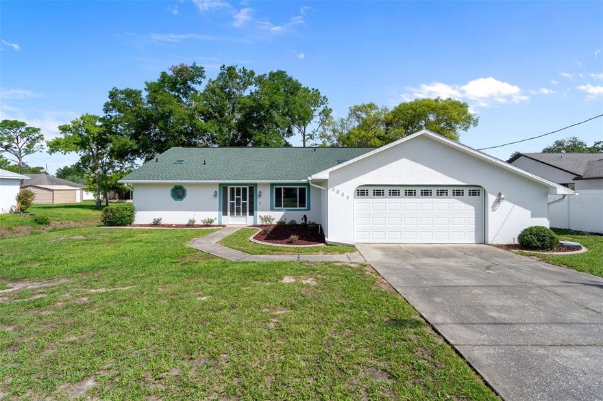 Welcome to this beautifully updated 3-bedroom, 2-bath home situated on a spacious 0.23-acre lot in a peaceful neighborhood. Offering 1,822 square feet of comfortable living space, this home blends style, function, and comfort—perfect for families, remote workers, or anyone looking to enjoy the Florida lifestyle. Step through the elegant double glass doors into an inviting living room featuring luxury vinyl plank flooring and an open, welcoming feel. The stunning kitchen is a true centerpiece, showcasing solid wood cabinetry, gorgeous quartz countertops, a built-in cooktop and oven, stainless steel appliances, and abundant storage—ideal for both everyday living and entertaining. A dedicated office/flex space adds versatility and can easily serve as a home office, hobby room, playroom, or guest space. The air-conditioned Florida room provides additional living space and a bright, relaxing area to enjoy year-round. With thoughtful updates throughout, spacious bedrooms, and a functional layout, this move-in-ready home offers the perfect combination of comfort, convenience, and modern appeal.