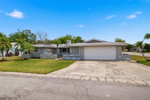 Photo of 4832 Shell Stream Boulevard, New Port Richey, FL 34652 (MLS # W7885408)
