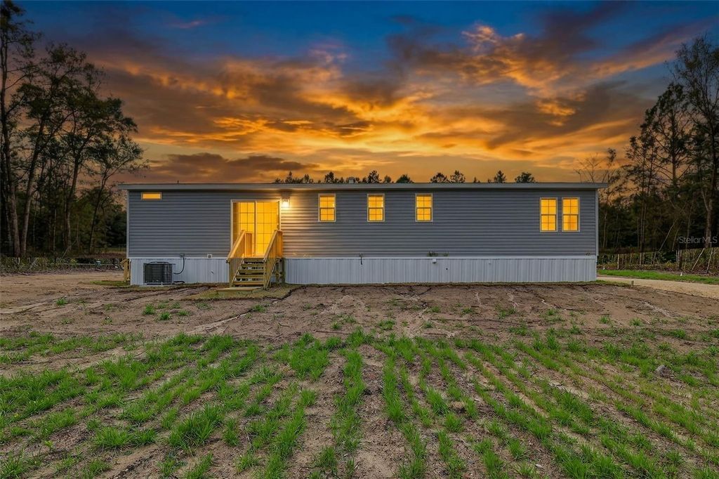 Photo of 16381 SW 57th St, Ocala, FL 34481 (MLS # OM720542)