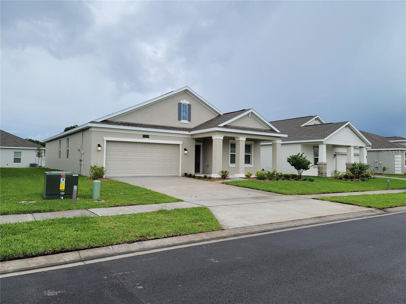 Envision yourself living in the warm and inviting Bourne model home. This exceptional three-bedroom, two-bathroom home features a welcoming front porch and a two-car garage. The open fully equipped kitchen overlooks the combination dining and family rooms. The spacious owner suite includes a separate bathtub and shower as well as his and her sinks. Lancaster Park East features a family-friendly lifestyle. Numerous ponds dot the community, where waterfront homesites are in a serene location just five miles from St. Cloud. Homebuyers enjoy the community’s pool and cabana, as well as parks and tot lots. The community also provides outstanding convenience, less than a half mile from US 192 (E. Irlo Bronson Memorial Hwy), a direct thoroughfare to St. Cloud and Florida’s Turnpike. Walt Disney World is 32 miles away. Royal St. Cloud Golf Links club is just 6.5 miles away.