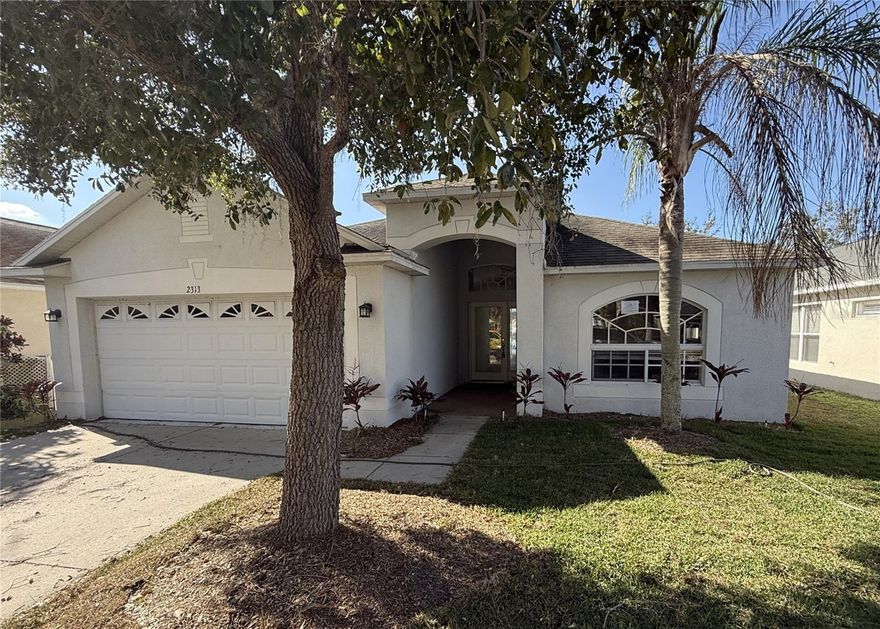 Welcome to River Bend in Ruskin, Florida, a desirable community offering convenience, comfort and scenic views. This single story concrete block home features 1,640 square feet with 3 bedrooms, 2 bathrooms and a 2 car garage. The open concept split floor plan welcomes you with a spacious living and dining area, perfect for everyday living and entertaining. The kitchen is located at the front of the home and offers ample cabinet and counter space, a closet pantry, breakfast nook and counter seating. Enjoy peaceful pond and backyard views from both the kitchen and family room. The primary suite is privately located and includes a walk in closet, dual sinks, soaking tub and separate walk in shower. Secondary bedrooms are positioned on the opposite side of the home and share a full guest bathroom, creating privacy for everyone. Convenient access to I 75, shopping, dining and local amenities makes this home ideal for commuters. This property may qualify for seller financing ( Vendee ).