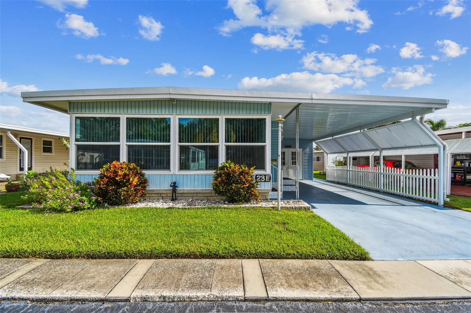 Bright & Inviting Manufactured Home in the Highly sought after Pointe West 55+ Community. Experience the ideal lifestyle in this Furnished home located just steps to Lake Seminole. This residence features two bedrooms and two bathrooms, Florida Room, "Man Cave" with a work bench all for a LOW maintenance fee of $300/month that includes water, sewer, trash removal and lawn care. Residents of Pointe West enjoy a wealth of amenities, including a heated Pool, clubhouse with lots of functioins, shuffleboard, billiards, horseshoe pit, Boat Slips and Private Access to Lake Seminole making this home an exceptional choice for an active and engaging lifestyle!
INTERIOR:The remodeled kitchen with Custom Cabinetry providing tons of storage is equipped with modern appliances, including a refrigerator, range, oven, ice maker, microwave, dishwasher, and disposal, making meal preparation a breeze. Laminate flooring flows throughout the Kitchen, Hallway and Florida Room. New Windows 2020, Roof 2016, HVAC with maintenance package 2014 seviced regularly. Fully furnished( with the exception of the high top kitchen table and chairs ), the décor is tastefully done and makes the move to your new home that much easier! The sizeble living room is great to unwind in and adjacent to the Bright and Light Florida room offering an inviting atmosphere, perfect for entertaining guests or enjoying family gatherings. The abundance of natural light that floods the Florida room from the wall of windows gives you a wonderful view of Lake Seminole adding to that Florida Lifestyle. The primary bedroom offers of an en-suite bathroom, Bay windows and is large enough to accomodate the King size bed. While the guest bedroom shares a hallway bathroom, no one will mind utilizing this space updated with a its beautiful custom cabinetry, ceramic tiled shower and updated lighting. As if this was not enough to entice you to this home, there is a very large 11 by 18 room off the carport that is perfect for a man cave with an additional area on the back with a work bench and more storage. The french doors add accessibility allowing for quick and easy handling of laundry tasks additional storing of all your Florida toys.
EXTERIOR:With its prime location on the picturesque Lake Seminole, this home presents a win-win situation for prospective buyers. Priced at $169,900 with a share, it offers exceptional value in a desirable location. The exterior features a well-maintained roof-over that was replaced in 2016, ensuring durability. Additoinal perks, Nest thermostat, Keyless entry, new gas grill additional storage shed in rear of unit. A useful double carport providing easy access and room for a golfcart or a space to enjoy outdoor living at its best. Go ahead, have that picnic with friends at the Lake Gazebo, ride bikes, or Fish off the banks of Lake Seminole. Additionally, this property is centrally located...Just a short walk or golf cart ride to shopping, Restaurants, Movies, and more. Our award winning Beaches are just 4 miles away, Catch a Rays game or enjoy a short commute to Downtown St Petersburg, 2 Airports and so much more!
One more terrific reason to make this home yours …the Family Florida car "Cherry Bomb" PT Cruiser can be Yours as well. Call today for your private showing.
