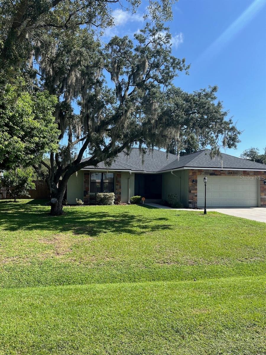Photo of 1209 Lake Loop, Winter Haven, FL 33880 (MLS # O6423604)