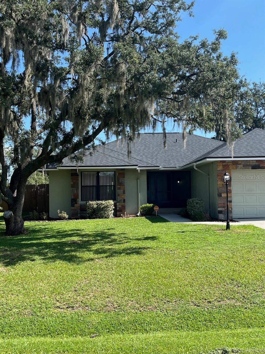 Photo of 1209 Lake Loop, Winter Haven, FL 33880 (MLS # O6423604)