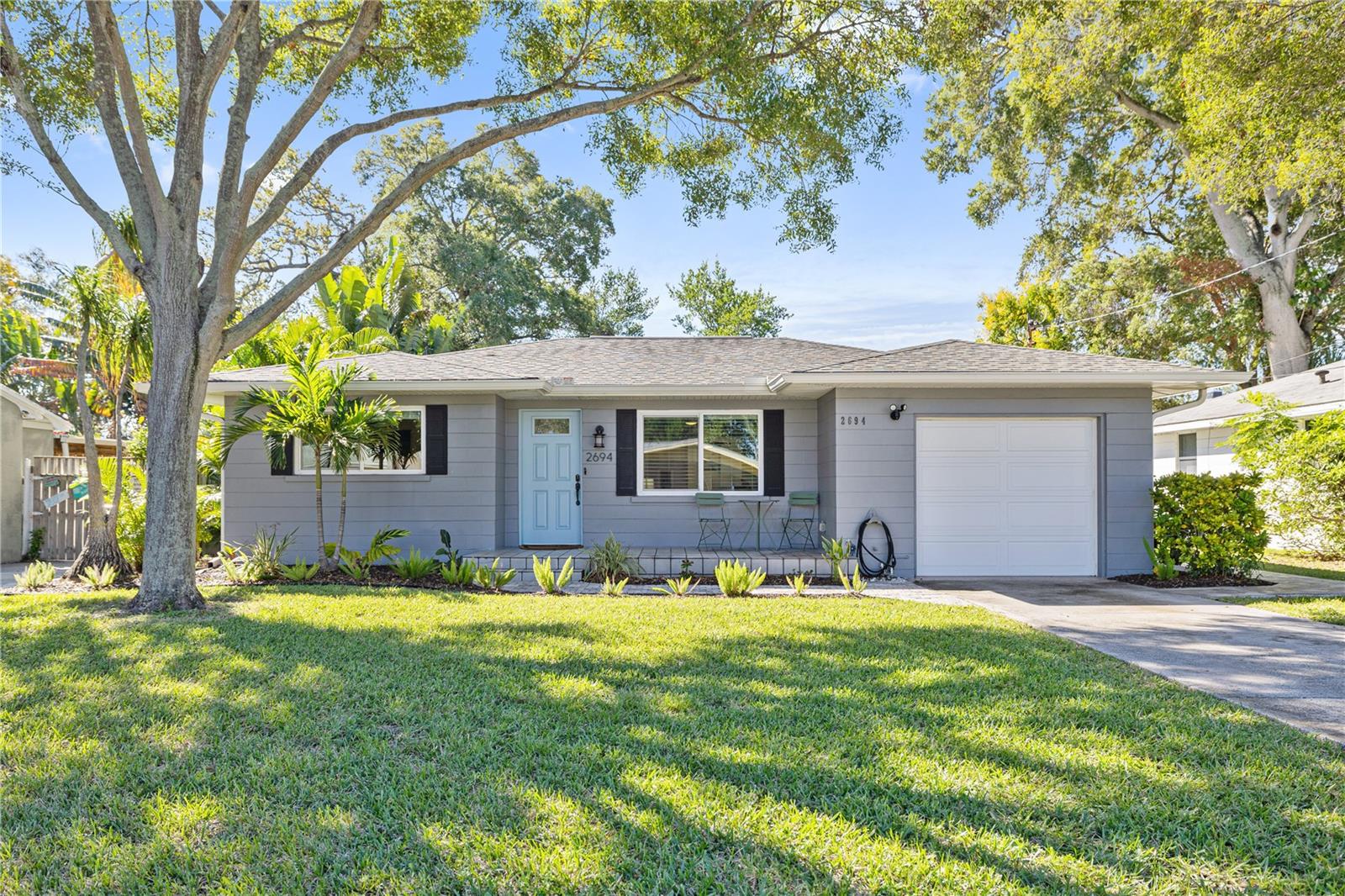 ***Rare, Short Term / Medium Term single family home available in Belleair Bluffs.*** This fully furnished clean house features 2 bedrooms and 2 baths w/ 1 car garage, and only 2 miles to the Gulf Beaches. The property has been updated from top to bottom, and features new plumbing, new electric, new impact double pane windows, new ceramic tile floors, new doors, newer A/C system (2020) , newer A/C ducts (2020), and a remodeled kitchen w/ new stainless steel appliances (2020) . Other highlights include oversized fenced in tropical back yard w/wood deck, new impact garage door w/ garage door opener, mud sink, 3 smart tv's, 2nd refrigerator in garage, washer & dryer, and plenty of storage. Belleair Bluffs offers many amenities all with-in walking distance of the property including: retail shopping, waterfront parks, playground, upscale restaurants, pizza shop, public boat ramps, coffee shops, breakfast restaurants, Publix, Belleair Market, and so much more. The bonus room could be a 3rd bedroom, office, etc. and there's also a den off the bonus room. This is a great opportunity to find a fully furnished turn-key rental that is updated with the cozy finishing touches. Included in the monthly rent is Electric, Water, Trash, Sewage, Pest Control, WIFI and Lawn Care. No Big Dogs. Available starting August 1st 2025 at a 90 day minimum. Schedule your showing today while available.