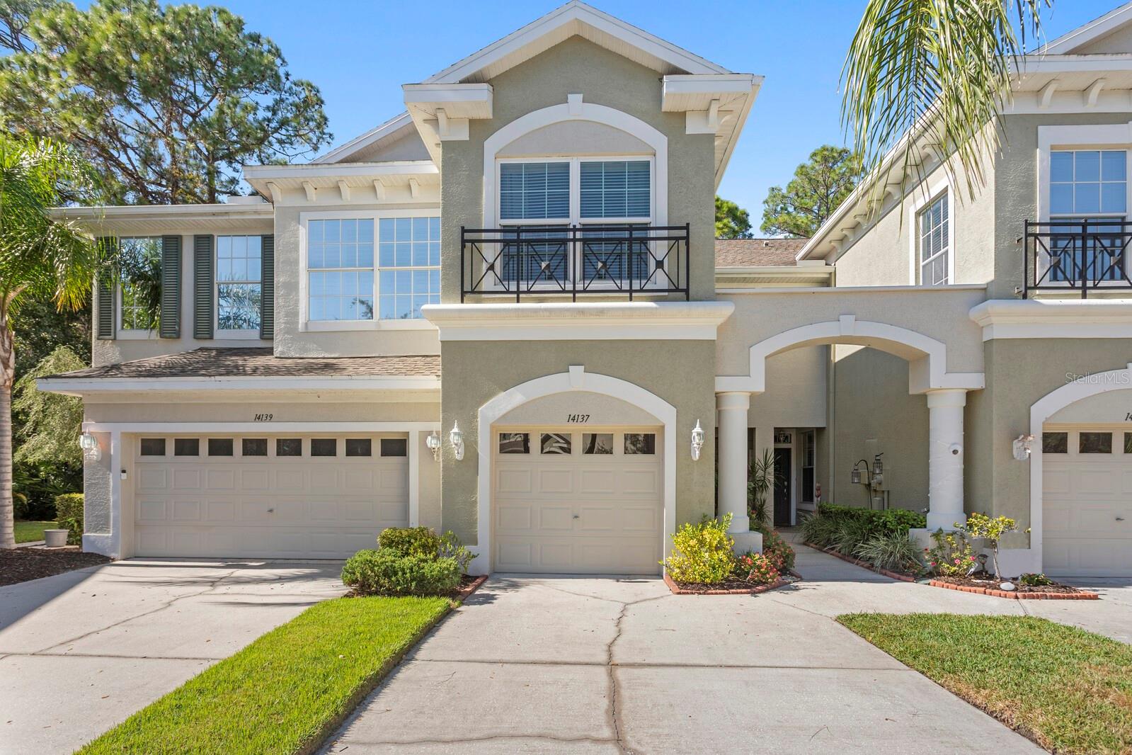 Welcome to this beautifully maintained 3-bedroom, 2.5-bath Townhome with an extended 1-car garage—nestled on a peaceful conservation lot in the desirable gated community of Hampton Chase. Designed for comfortable and stylish living, this home features a bright, open floor plan with abundant natural light and tasteful finishes throughout. The Living and Dining Rooms showcase elegant wood flooring and large windows framing serene conservation views. Sliding doors lead to a covered, extended patio with a privacy fence—perfect for al fresco dining or enjoying your morning coffee while watching the occasional wildlife. The spacious eat-in Kitchen is ideal for entertaining, featuring stainless steel appliances, wood cabinetry, granite countertops, two breakfast bars for casual dining, tile flooring, a double sink, a closet pantry, and generous counter space. A convenient half bath and a large under-stair storage closet complete the first floor. Upstairs, you’ll find 3 generously sized bedrooms, including a Primary Suite with sliding doors to a screened balcony overlooking the tranquil conservation. The suite includes a large walk-in closet and a luxurious ensuite bath renovated with wood cabinetry, granite counters, dual sinks, a large walk-in shower, travertine flooring, and decorative built-in glass shelving. Two additional bedrooms—one with a walk-in closet and the other with dual wall closets—share a beautifully appointed full bath with dual sinks, quartz countertops, and a tub/shower combination. For added convenience, the laundry closet is located on the second floor near all bedrooms. Recent upgrades and features include: Impact-rated triple-pane windows (up to 150 mph wind resistance) with transferable lifetime warranty, New refrigerator (2023). For durability and energy efficiency, this townhome was built with concrete block on both levels. Hampton Chase is known for its peaceful ambiance, friendly neighbors, and well-maintained amenities, including a heated year-round community pool and playground. Ideally located near A-rated schools, this home offers easy access to Tampa International Airport, shopping, dining, entertainment, and the beautiful Gulf beaches—everything Tampa Bay has to offer at your doorstep.