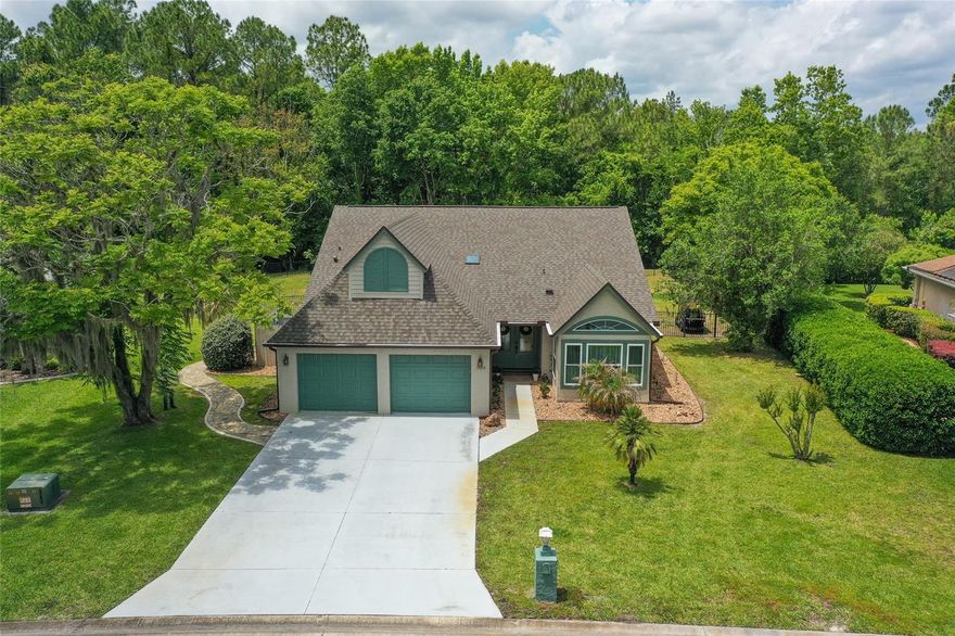 Lovely home completely remodeled on an exceptional oversized lot that backs up to one of the largest nature preserves in the Fly-In. Concrete block construction. New 50-gallon hot water tank 2023, new roof/skylights 2021, new double-pane storm impact windows/sliders 2020, new exterior paint 2021, new AC system 2017, new kitchen with quartz counters 2018, new bathrooms 2018, new paver patio 2017. The owner's suite has 2 walk-in closets and an amazing spa bath with a walk-in shower & free-standing tub. Open floor plan, including a 234-square-foot air-conditioned enclosed lanai with new windows and offering a 2019 AC mini split (lanai not included in AC space). The black aluminum fence (2020) has 3 gates for easy access. You will love mother nature at its best with deer and turkey visiting. Read additional remarks regarding the renter. You will enjoy the gorgeous private retreat outdoors with an oversized lot. Plenty of room for a pool. You will also enjoy views of a lake from a neighboring lot. Pride of ownership is not only found in this home but in the surrounding homes as well. Attention: the home is currently rented until July 31, 2023. Excellent renter currently pays $3,000 per month and would prefer to continue renting. Spruce Creek is America's premier, gated, country club, and fly-in community including 2 manned guard gates, 24/7 roving security, park, kids recreation area, fenced vehicle storage area with property management on site. Spruce Creek Country Club features a championship golf course, racquet center with pro shop, lighted tennis and pickleball courts, pool with food service, informal & formal dining areas plus a fitness room. The airport offers a 4,000-foot paved runway with GPS approach & VASI lights, 2 fuel farms, commercial hangars, helipad, Downwind restaurant, salon and miscellaneous area aviation & professional businesses. A short distance to restaurants, shopping & theater; 15 min from the world's most famous beach, 20 minutes to Embry Riddle Aeronautical University, 1 hour to Orlando, & 3 hours to Miami.