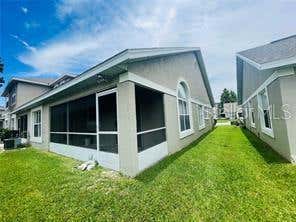 Photo of 2206 Cypress Knee Loop, Kissimmee, FL 34743 (MLS # S5154175)