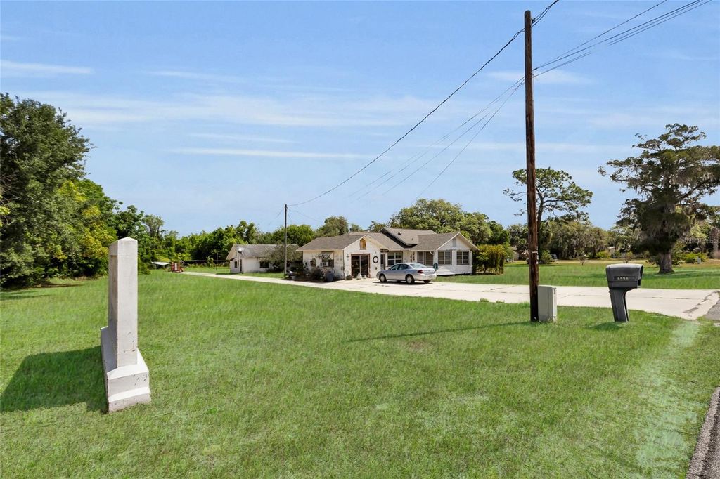 Photo of 5223 Eagles Nest Road, Fruitland Park, FL 34731 (MLS # OM723754)