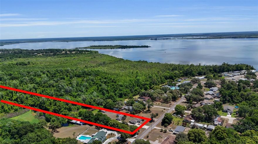 Discover a waterfront estate where privacy, recreation, and versatility come together on 4.38 acres. Offering 5 bedrooms and 5 bathrooms across multiple residences, this unique property is ideal as a family compound, private retreat, or homestead. Direct canal access to Lake Griffin, along with a boathouse with 18 boat stalls, private ramp, and fish cleaning station, creates a true haven for boating and fishing enthusiasts. Expansive acreage invites gardens, animals, hobby farming, workshops, and room for all your recreational toys. A rare opportunity to enjoy waterfront living with the space and flexibility to create your own estate lifestyle. Does need some TLC.