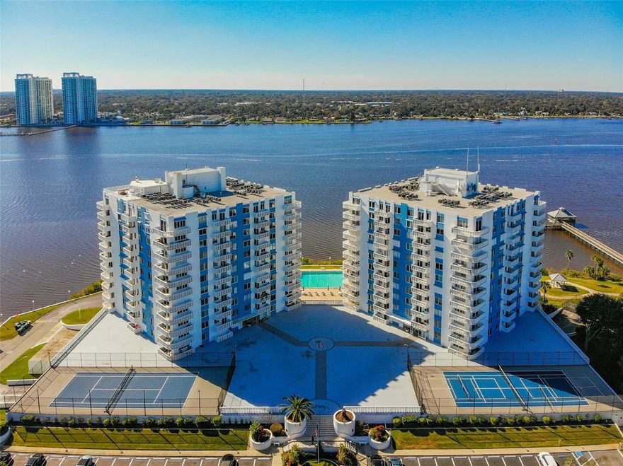 **MOTIVATED SELLER***STUNNING INTRACOASTAL VIEWS FROM EVERY WINDOW ***SIT BACK AND RELAX ON YOUR 1ST FLOOR BALCONY AND WATCH THE MARINE LIFE AND BOATS PASS BY. This 1 bedroom 1 bath direct riverfront unit is located in the south tower at the tranquil Bayshore Condo Community. This unit includes a Deeded Garage Parking Space, newer dishwasher, garbage disposal, microwave convection oven, and refrigerator. Extra bathroom sink could be installed in hallway next to the bathroom (GFCI outlet installed). Amenities include riverfront pool, saunas, steam rooms, game rooms, library, cardio room, weight room billiards room, club room, shuffle board, pickle ball and tennis! Within walking distance to the beach, river, shopping, and restaurants. ;Water: City