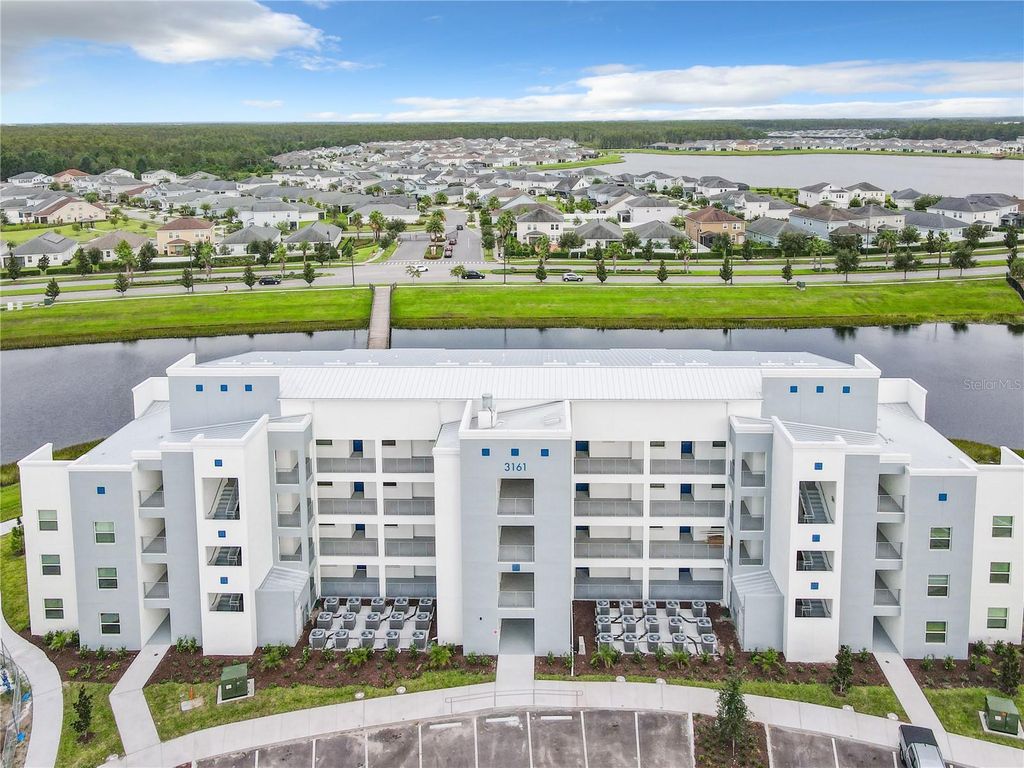 Photo of 3161 Paradox Circle #101, Kissimmee, FL 34746 (MLS # O6365592)