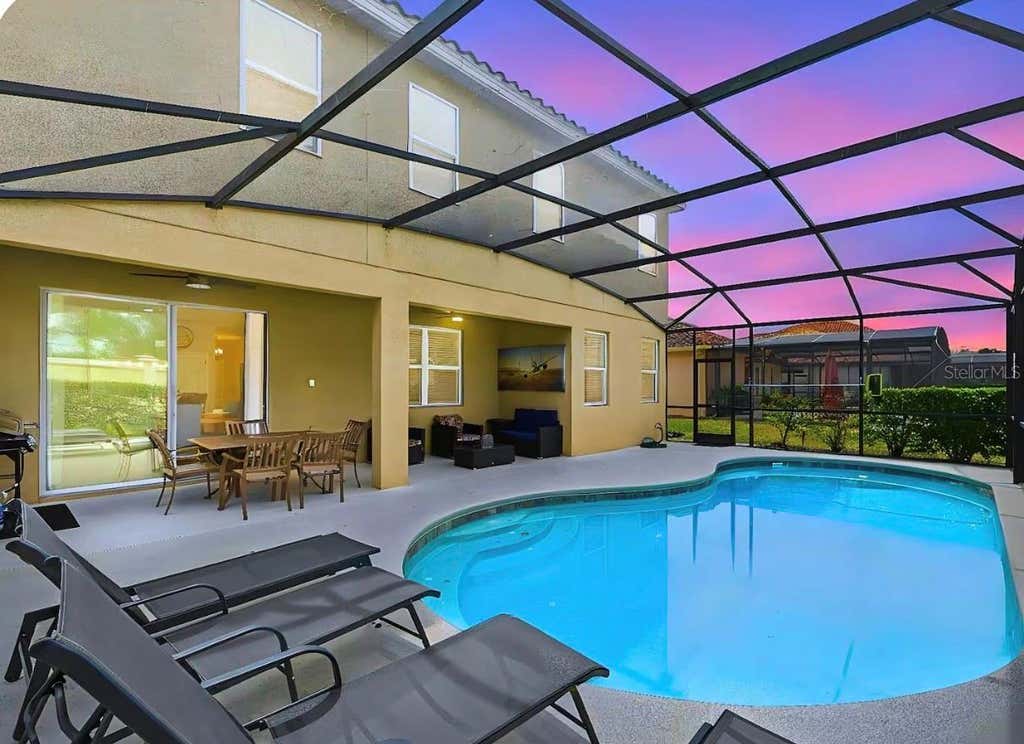 Photo of 4035 Oakrise Loop, Davenport, FL 33837 (MLS # O6434411)