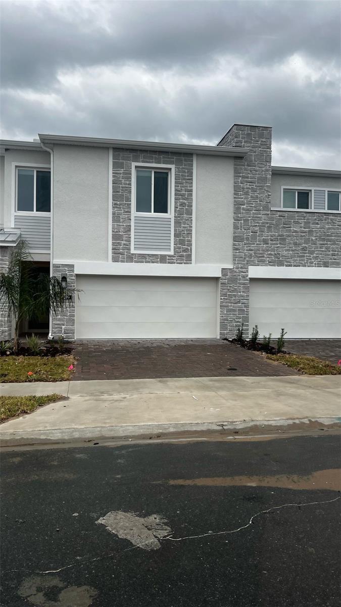 Welcome to Champions Pointe, this two-story home with an inspired kitchen, dining room, and spacious great rooms. All three bedrooms are situated on the second floor, including the owner’s suite, an en-suite bathroom, and a walk-in closet, a water filter throughout the house, and the yard is completely fenced. It's a premier recreation and entertainment destination. This community is just a 20-minute drive from Disney World via I-4 and FL-429. Close proximity to US-27 and other major routes offers easy travel throughout Florida and its attractions.