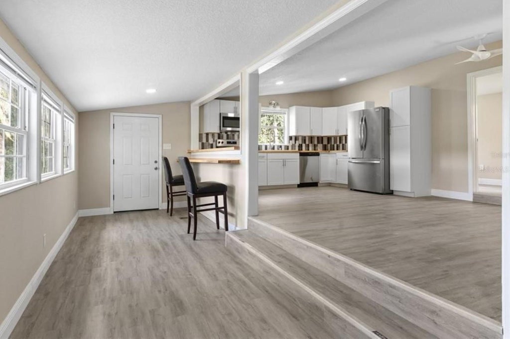 Photo of 15375 SE 64th Place, Ocklawaha, FL 32179 (MLS # R4912106)