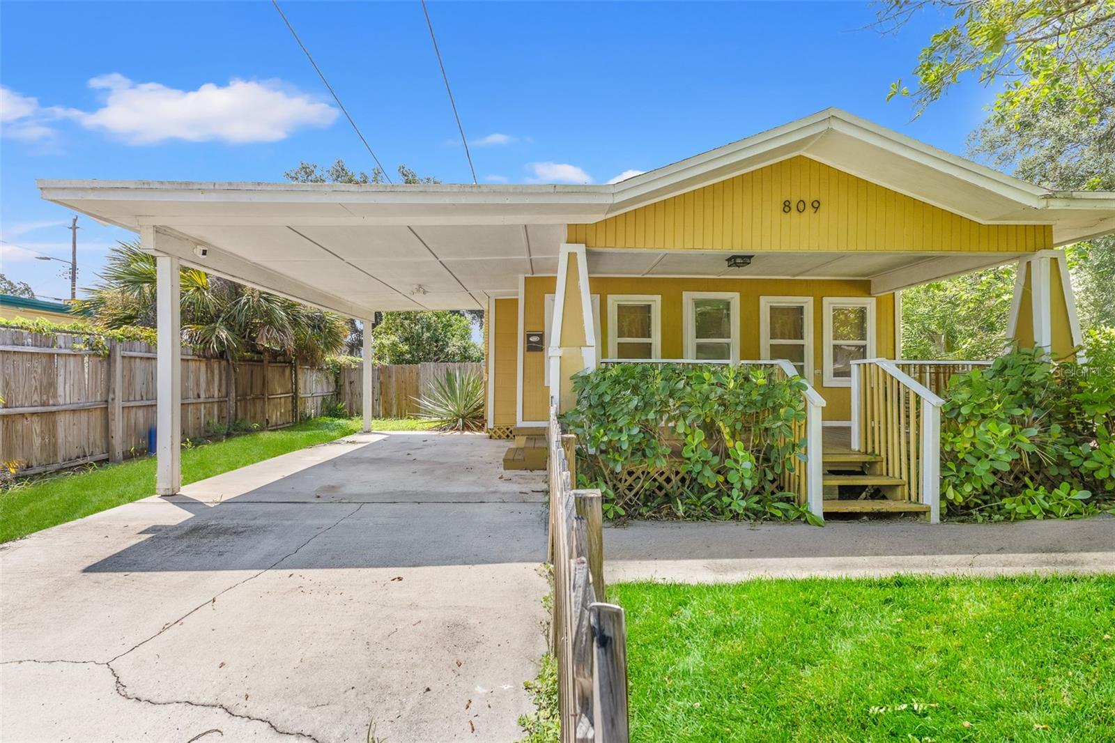 One or more photo(s) has been virtually staged. This beautiful 2-bedroom, 1-bath home is full of charm and character, perfectly located in the heart of Seminole Heights. From the moment you arrive, the inviting curb appeal and classic front porch set the tone for the warmth you’ll find inside. Spend your evenings with a glass of wine in hand and mornings with a cup of Joe- either way this porch will be the best part of your day! Step through the front door into a light-filled living space that flows seamlessly into the dining area and kitchen. The kitchen has been thoughtfully updated with modern appliances, granite countertops, and crisp cabinetry, making it both stylish and functional. Both bedrooms are generously sized with plenty of natural light, while the bathroom has been refreshed with an earthy warm tone and modern finishes. Throughout the home, you’ll find a move-in-ready space that feels like new while still retaining its Seminole Heights charm. Out back, enjoy a spacious fenced yard with endless potential, perfect for entertaining, gardening, or simply relaxing under the shade of mature trees. Located just minutes from Tampa’s best restaurants, breweries, coffee shops, and downtown, this home offers the perfect blend of comfort, convenience, and lifestyle. Love the furniture? You can buy that too!