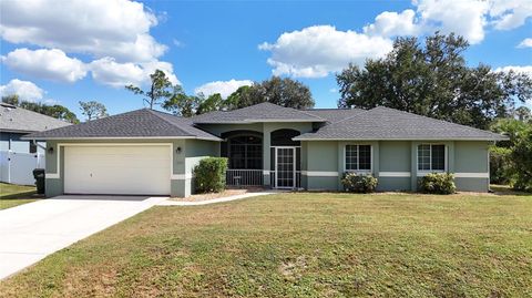 Photo of 1674 Ardisia Street, North Port, FL 34288 (MLS # C7516327)