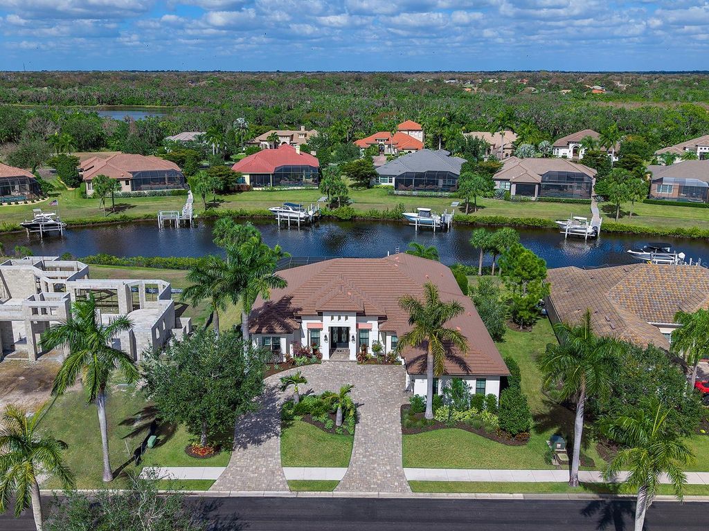 Photo of 11708 Rive Isle Run, Parrish, FL 34219 (MLS # A4683414)