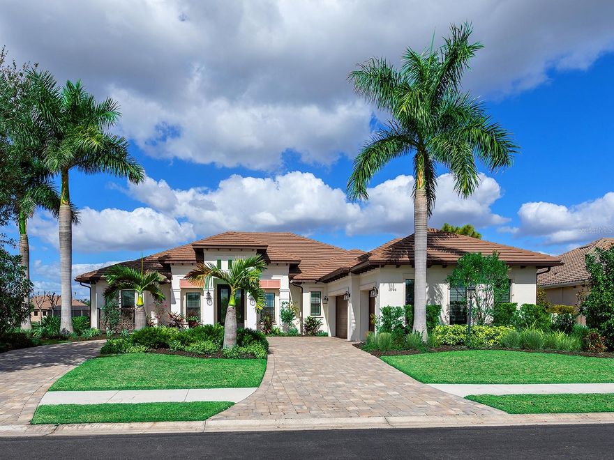 The Islands on The Manatee River was just awarded one of the BEST OVERALL COMMUNITIES in the 2026 Parade of homes for Manatee & Sarasota Counties. Set within a private, gated waterfront boating community along the scenic banks of the Manatee River, this exceptional property offers a rare opportunity to experience Florida living with navigable access to the Gulf, inviting effortless days of boating, fishing and sunset cruising. The community has been designed to preserve the region’s natural beauty, with majestic live oak canopies, protected mangrove shorelines that enhance privacy and environmental integrity, and an abundance of native wildlife that creates a tranquil, park-like setting. This stunning semi-custom residence by renowned builder Lee Wetherington offers refined waterfront living with exceptional craftsmanship and designer details throughout. Thoughtfully designed with an open floor plan, soaring ceilings, impact glass windows and doors and elegant finishes throughout. The home centers around a welcoming family room with a dramatic wall of pocketing sliders, which open fully to an oversized lanai. Here, a heated saltwater pool and spacious screened patio create a private resort-style retreat overlooking tranquil waters beyond. The kitchen blends warmth and functionality with rich stained cabinetry, granite countertops, oversized island, five-burner induction cooktop, built-in oven and microwave, and large walk-in pantry. An adjacent dining area captures the same picturesque water views, enhancing the home’s indoor-outdoor lifestyle. The nearby flex room offers ideal space for a fitness room, game room or media room. The light-filled primary suite is a serene escape, complemented by a spa-inspired en-suite bath with dual vanities and a makeup area, granite countertops, wood cabinetry, a walk-in shower, soaking tub and two custom walk-in closets. A second bedroom with walk-in closet enjoys convenient access to a full bath adjacent to the versatile bonus room, used as an office. A private third bedroom with en-suite bath and walk-in closet is across from the laundry room. The bright laundry room provides an abundant workspace and storage space, a front-load washer and dryer, laundry sink and closet neatly concealed behind double pocket doors. In addition, this home features an oversized three-car sideload garage, stone-paved circular drive, and an almost half-acre lot with direct water access from the dock equipped with water and electric, a kayak launch and approved for a boat lift. Residents enjoy exclusive access to The River Lodge, a riverfront clubhouse reserved solely for homeowners within The Islands on the Manatee River. This inviting social hub features gathering spaces for events, a fitness center, and outdoor seating areas with grill and firepit. Additional neighborhood amenities include a fishing pier, boat launch, bocce ball court, and shaded park and picnic areas, all supporting a relaxed waterfront lifestyle where nature and community come together seamlessly. The Club at River Wilderness offers dining for lunch and dinner, and opportunities for golf, fitness and social memberships. For buyers seeking not just a home but a lifestyle defined by tranquility, recreation and prestige, this residence is an exceptional opportunity.