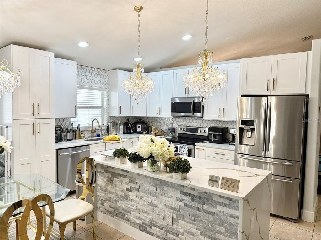 Photo of 12303 Holmwood Greens Place, Riverview, FL 33579 (MLS # TB8428133)