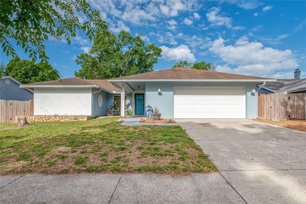 Photo of 18322 Swan Lake Drive, Lutz, FL 33549 (MLS # TB8489278)
