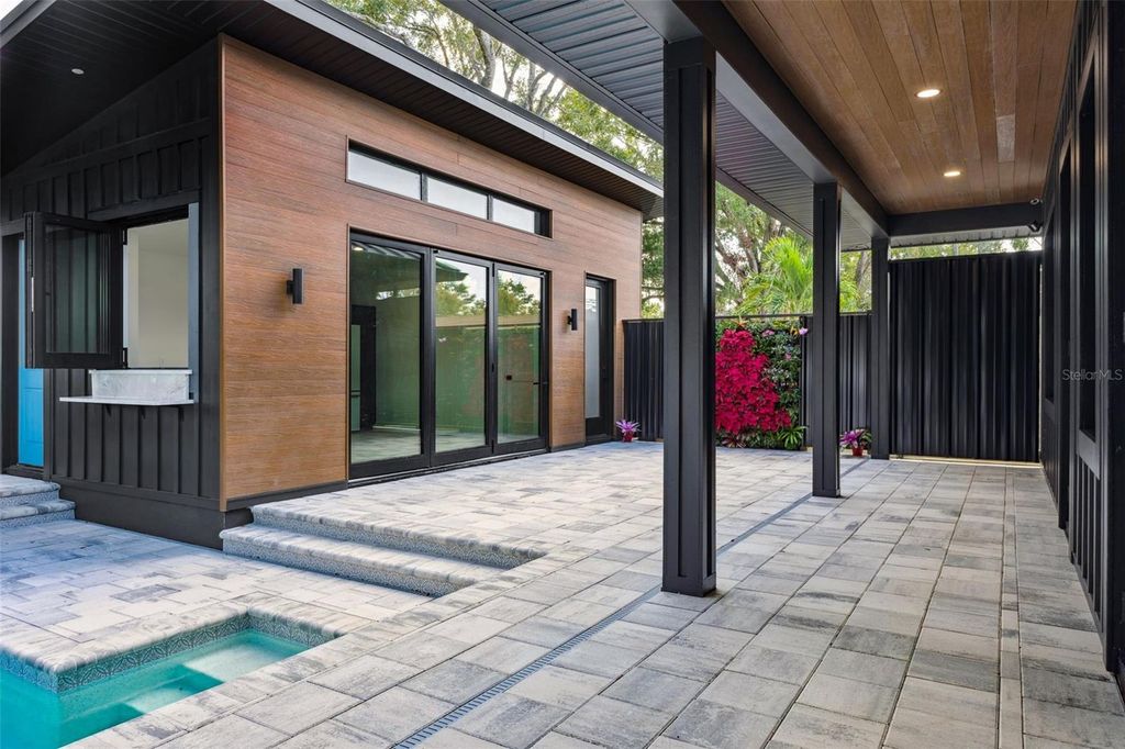 Photo of 708 W Kentucky Avenue, Tampa, FL 33603 (MLS # TB8451255)