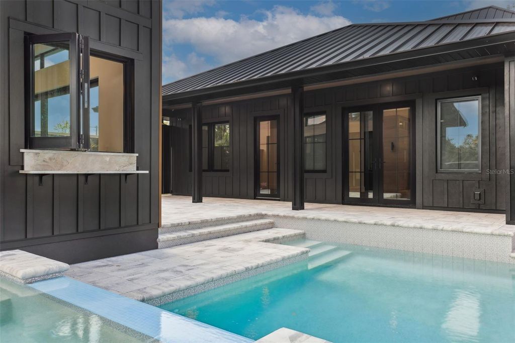 Photo of 708 W Kentucky Avenue, Tampa, FL 33603 (MLS # TB8451255)