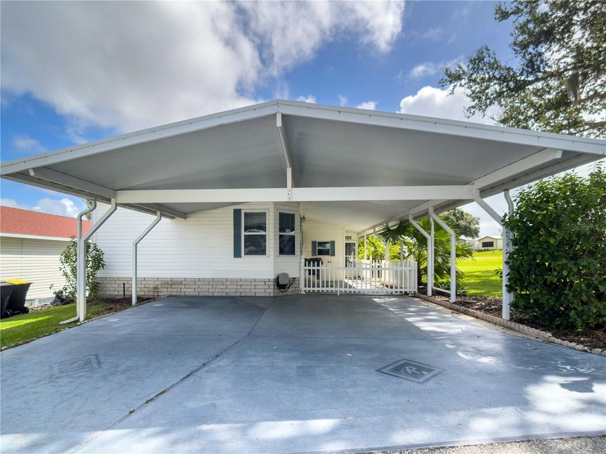 Welcome to this well-maintained 3-bedroom, 2-bath home located in a desirable gated community along Highway 27 in Davenport. This spacious residence features an open floor plan with a bright living area, a functional kitchen, and two full bathrooms including a primary suite with dual sinks and a walk-in shower. Enjoy outdoor living with a large covered carport, a screened patio perfect for relaxing, and an attached workshop with built-in shelving for extra storage. The community offers resort-style amenities including a clubhouse, pool, fitness center, and recreational activities, all conveniently located near shopping, dining, medical facilities, and I-4 for easy access to Orlando, Disney, and Tampa. Pets considered with approval.