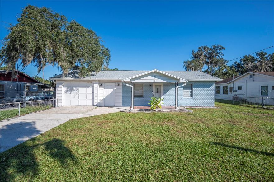 Welcome to your slice of Florida paradise!
This beautifully updated 3-bedroom, 2-bath home has all the charm and upgrades you’ve been searching for. Step inside to find an inviting layout featuring sleek laminate and tile flooring throughout — that’s right, no carpet anywhere! The kitchen is a showstopper with gleaming granite countertops, stainless steel appliances, and a brand-new microwave ready for your next culinary adventure.

Enjoy your morning coffee or evening unwind in the cozy Florida room, perfect for soaking in the sunshine all year long. The roof is 2 years new, the AC is just 5 years young, and there’s even new insulation to keep things comfortable and efficient.

Love your toys? You’ll appreciate the electric and water hookups already in place for your RV on the right side of the home. Plus, with no HOA, you can bring the RV, boat, or whatever your heart desires!

Out back, a huge fenced-in yard gives you space for pets, play, or a future pool — the possibilities are endless. And don’t forget the separate utility room, ideal for extra storage, a workshop, or a hobby space.

This home truly has it all — comfort, convenience, and freedom — all wrapped up in one perfectly maintained package!