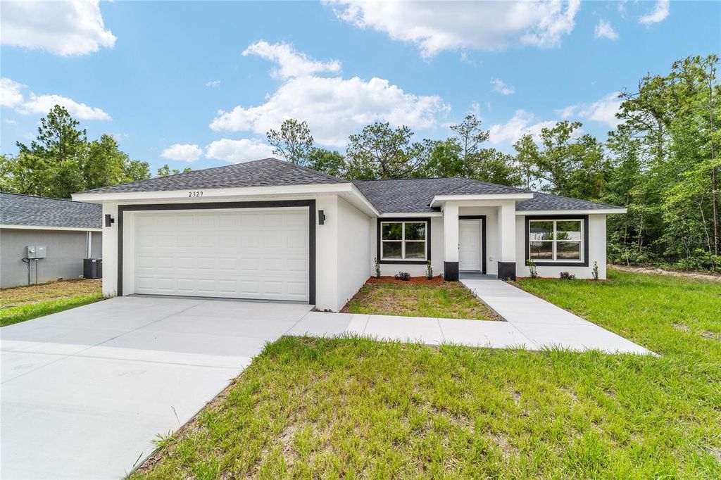 Photo of 13737 SW 114th Place, Dunnellon, FL 34432 (MLS # OM723550)