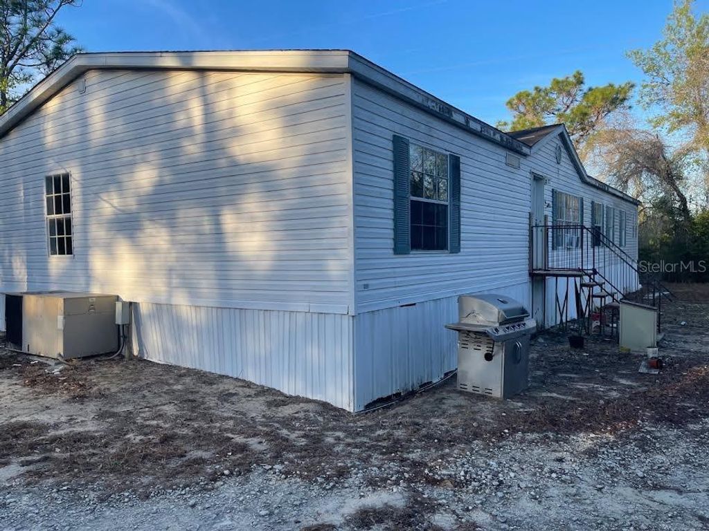Photo of 14018 Hexam Rd, Brooksville, FL 34613 (MLS # W7882545)