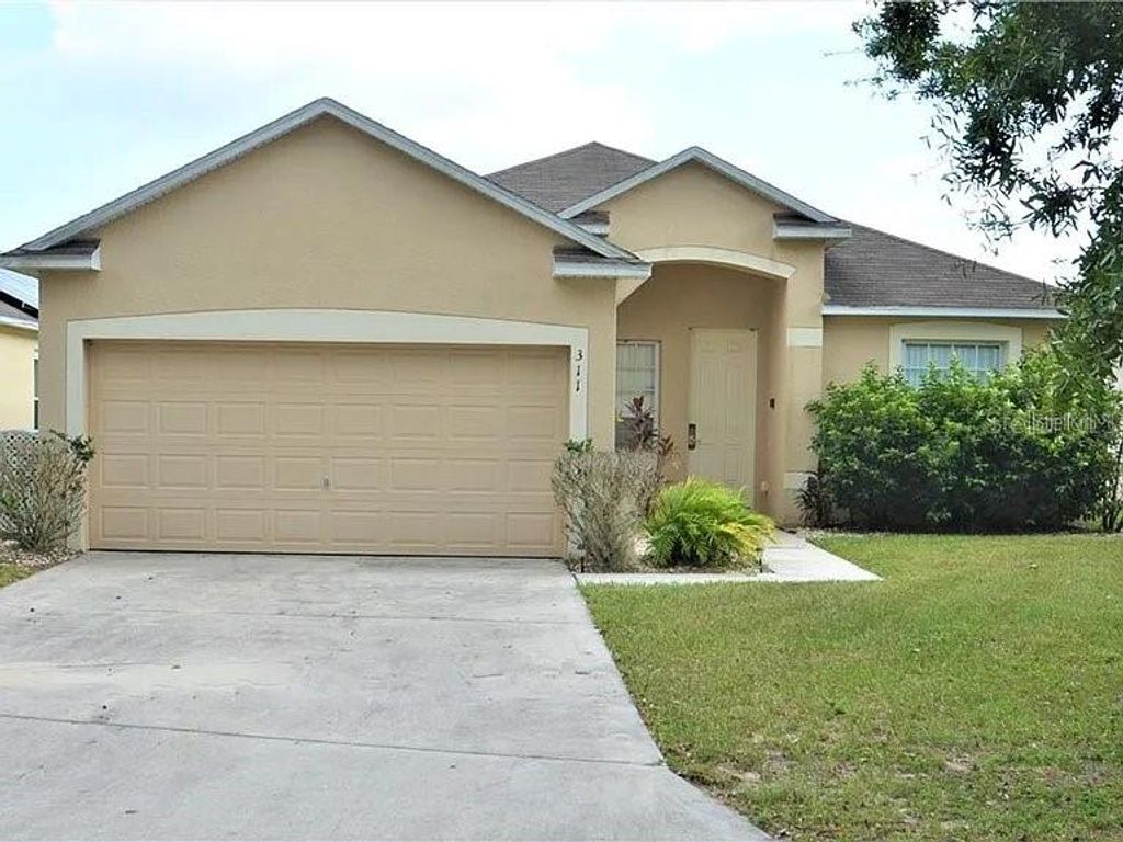 Photo of 311 Sunset View Drive, Davenport, FL 33837 (MLS # O6402874)