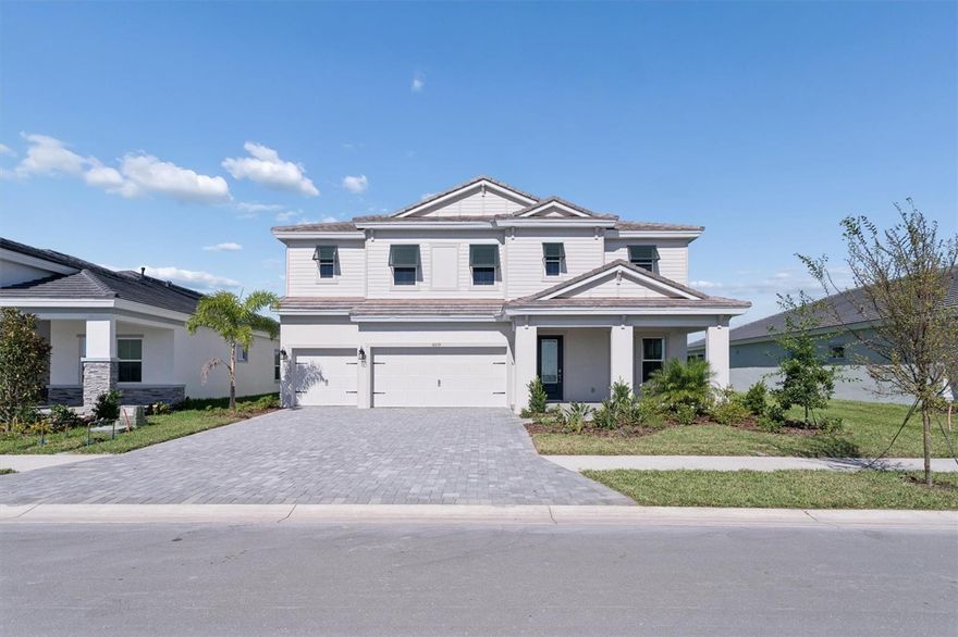 Verona - 
Welcome to the Cedar Key II at Crosswind Ranch in Parrish, FL! This exquisite two story Quick Move In home is designed to captivate and inspire, and it's ready for move in. Imagine life in this stunning five bedroom home, where the perfect blend of style and function creates an atmosphere you'll love coming back to. As you enter, the open concept floorplan immediately feels welcoming, flowing from the foyer into a dedicated den or private home office, a peaceful spot for work or study. The heart of the first floor is a continuous, bright space uniting the generous grand room, a beautiful island kitchen, and the casual dining area, making it ideal for everything from cozy family dinners to hosting friends. A convenient guest suite and full bathroom are also located downstairs, offering comfort and privacy for visitors or extended family, while the kitchen is a true highlight, featuring exquisite Timberlake cabinets in Maddox Painted Harbor and an upgraded gourmet gas appliance package that will inspire your inner chef. Outside, you'll find an expansive covered lanai that provides a serene setting to enjoy the truly stunning water and conservation views, a perfect escape. Upstairs, the home continues to impress with an expansive bonus room for entertainment or relaxation, a private owner’s retreat, and oversized secondary bedrooms, all boasting spacious walk in closets for effortless organization. This home is more than just a place to live; it's a beautiful canvas for your life. Listing Price amount for this Pending Sale includes Design and Structural Options.