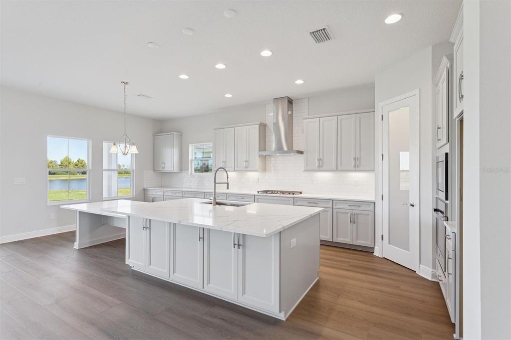 Photo of 10239 Longmeadow Avenue, Parrish, FL 34219 (MLS # TB8438867)