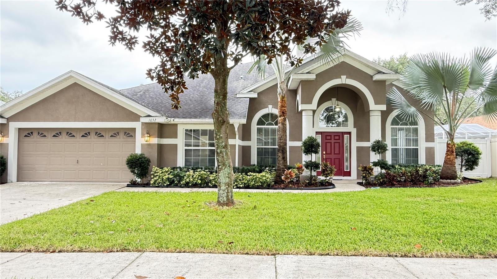 One or more photo(s) has been virtually staged. Don’t miss this beautifully updated 4 bedroom, 3 bath semi-custom home in a quiet Valrico cul-de-sac community of just 29 homes! Recently refreshed with newly renovated bathrooms, fresh interior paint, and elegant porcelain tile flooring, this move-in-ready home also features soaring 12’ ceilings, a spacious open layout, and a chef’s kitchen with solid wood cabinetry, brand-new granite countertops, stainless steel appliances, and an oversized island with seating for eight. Pocket sliders open to a heated and cooled Florida room filled with natural light, while the private master suite boasts bamboo laminate flooring, tray ceiling, walk-in closet, and a spa-style bath with dual vanities, soaking tub, and walk-in shower. With, large indoor laundry/flex room, top-rated schools, and proximity to shopping and dining, this is a rare opportunity to own a meticulously maintained home in the heart of Valrico. One or more photo(s) have been virtually staged.