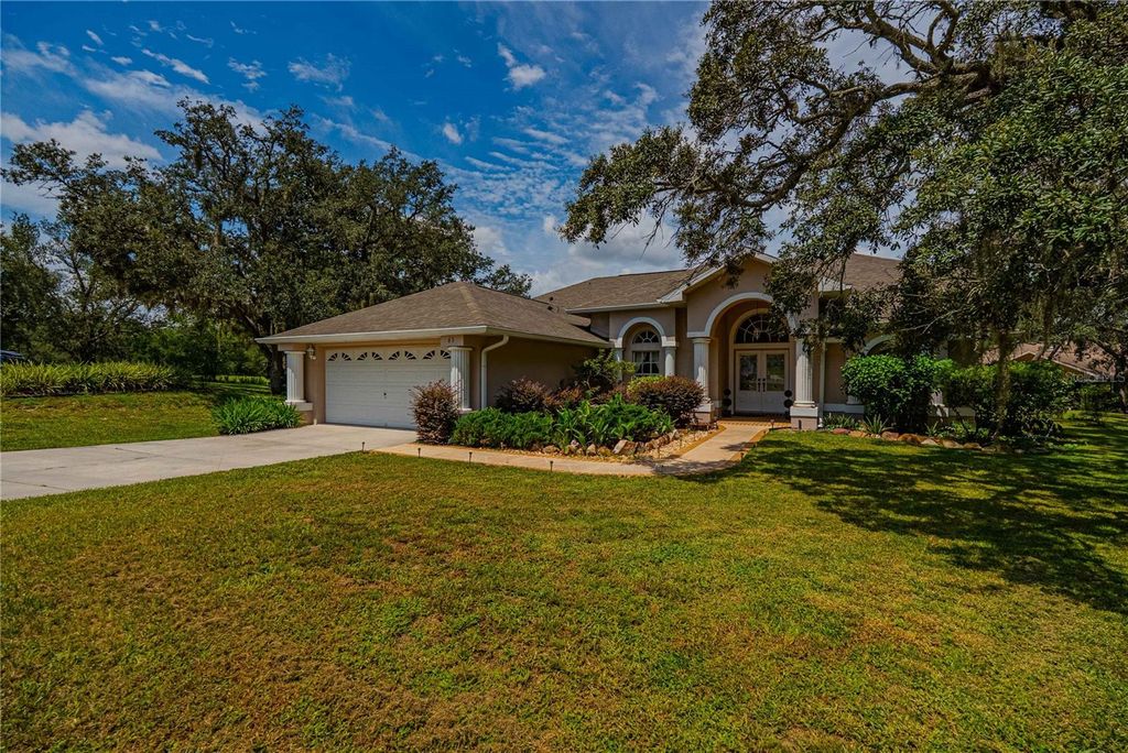 Photo of 63 Forest Wood Court, Spring Hill, FL 34609 (MLS # TB8439244)
