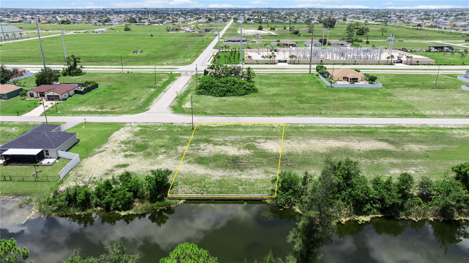 SEAWALL in PLACE! Build your dream home on this beautiful freshwater canal lot located in the fast-growing NW Cape Coral area! This 0.23-acre parcel offers stunning water views and access to miles of freshwater canals and nearby lakes—perfect for kayaking, fishing, or enjoying the peaceful Florida lifestyle. Situated in a quiet residential neighborhood with newer homes, No HOA and no time limit to build, giving you flexibility and freedom. No Environmental issues or endangered species present. No Flood Zone