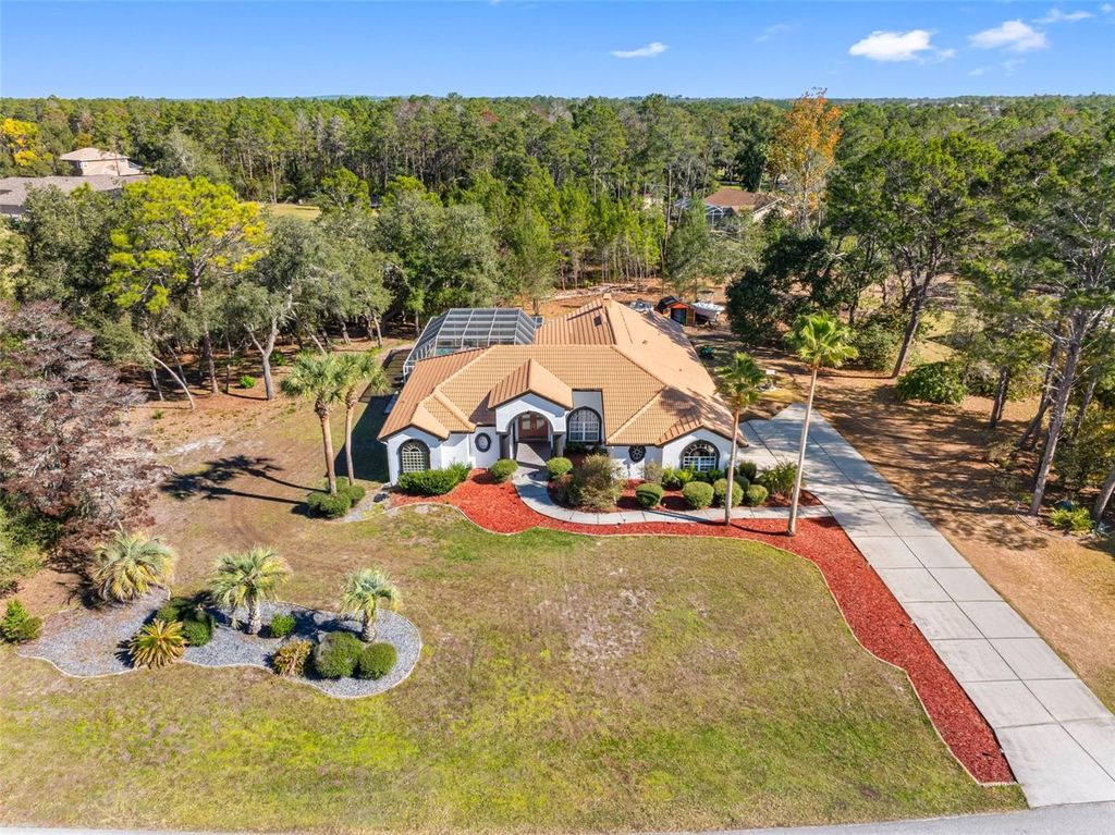 Photo of 9336 Tooke Shore Drive, Weeki Wachee, FL 34613 (MLS # TB8457352)