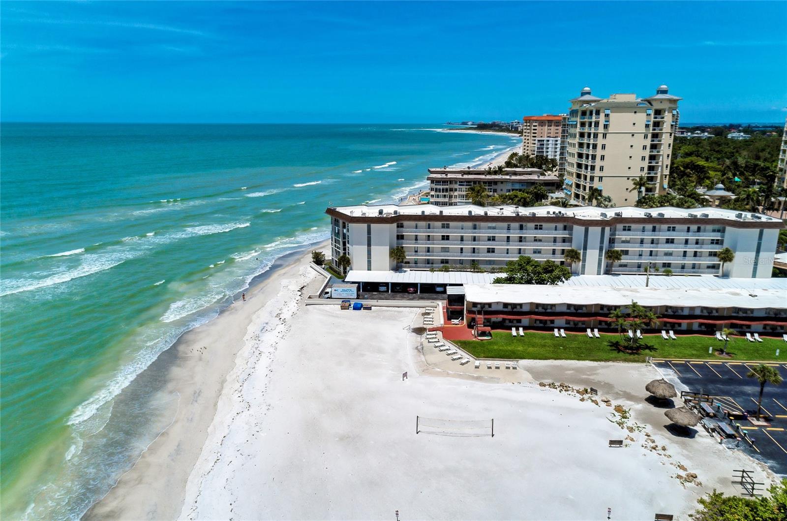 RENTAL: AVAILABLE NOW JUN-SEP. - gorgeous Gulf side rental: 4th floor, 2 bedroom, 2 bath residence at the exclusive southern tip of Lido Key. Expansive views of the Gulf of Mexico from most rooms. Relax with your coffee and listen to the waves and the dolphins at play. Beautifully renovated throughout. Beautiful custom granite baths, handsome kitchen tile and cabinetry with stainless appliances Coastal well-appointed décor throughout. Kitchen looks over the dining and living room, perfect for entertaining. Master bedroom overlooks the Gulf with king size bed, patio access and private ensuite bath awaits you. Guest room offers twin accommodations. Gulf view, works pace for those who need can work from home. For your comfort, there’s a full-size washer and dryer, wifi, flat screen tv’s and covered parking. Amenities include heated pool, clubhouse, fitness, shuffleboard. Adjacent to South Lido County Park with nature trails, kayaking and fishing. Walk or bike to St. Armand's for world class shopping and dining. Pristine sugar sand beach, magnificent sunsets each night at of one of the most desirable premier vacation destinations of the world. Available June 4th through September, 2025. No pets permitted.