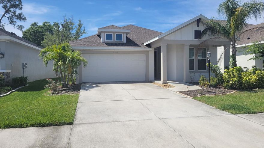 Annual Unfurnished 3/2 home in Moss Creek, a gated community one block south of SR-70. This home has an open floor plan and is filled with sunlight from abundant large windows. The kitchen has solid wooden cabinetry topped with slab quartz counters, custom subway style backsplash, an island with breakfast bar, stainless steel appliance and large pantry. The master bedroom is large with a spacious walk in closet and en suite bathroom with dual sinks and huge walk in shower. The other two bedrooms are near the front of this home. This home offers high ceilings, 8 foot doors and mostly solid surface flooring. The laundry room has extra storage. There is a covered patio in the rear and a two car garage. This community also offers a large swimming pool so you can enjoy taking a dip in the pool and hanging out in the community clubroom. This property is very convenient to shopping, dining, there is a park across the street, the library and not far from I-75, the airport, downtown Sarasota or the beach. CALL NOW! This community is governed by a homeowners association. Approval may include an application, background screening, fees, and an approval process. Contact the agent for details.